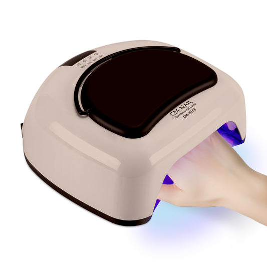 Nail Lamp CM-P60 Beige with 24 ceramic LED beads, showcasing a hand under UV light for professional gel polish curing.