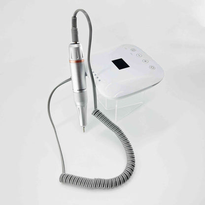 Nail Drill S30 displayed with its ergonomic silver drill pen and compact white control unit, designed for smooth and quiet operation.